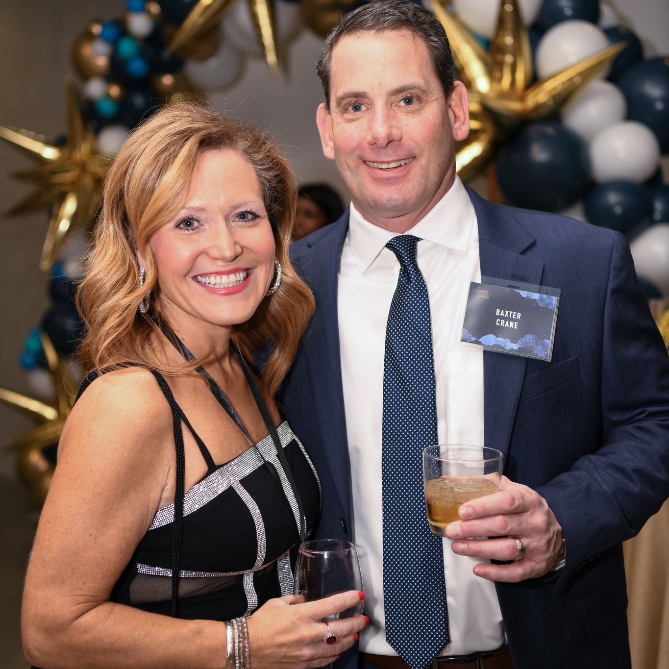 Molly and Baxter at cocktail party event