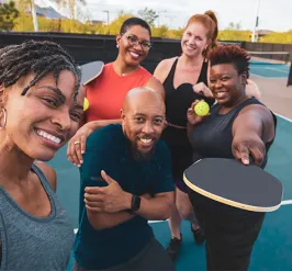 Group playing pickleball