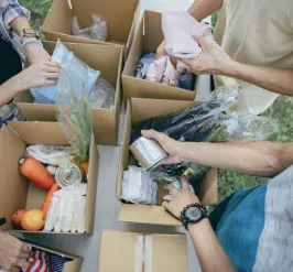 Food distributing- veggies, canned soup