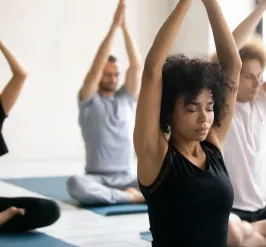 group of adults participating in yoga