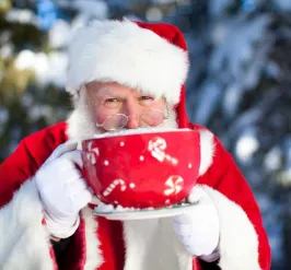 A photo of Santa drinking Coco