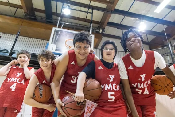 adaptive basketball team posing for a photo