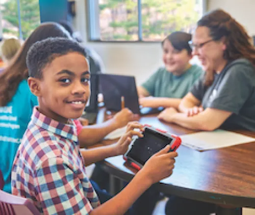 Y Explore participant using a tablet