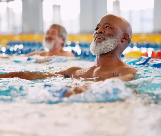an adult taking swim lessons